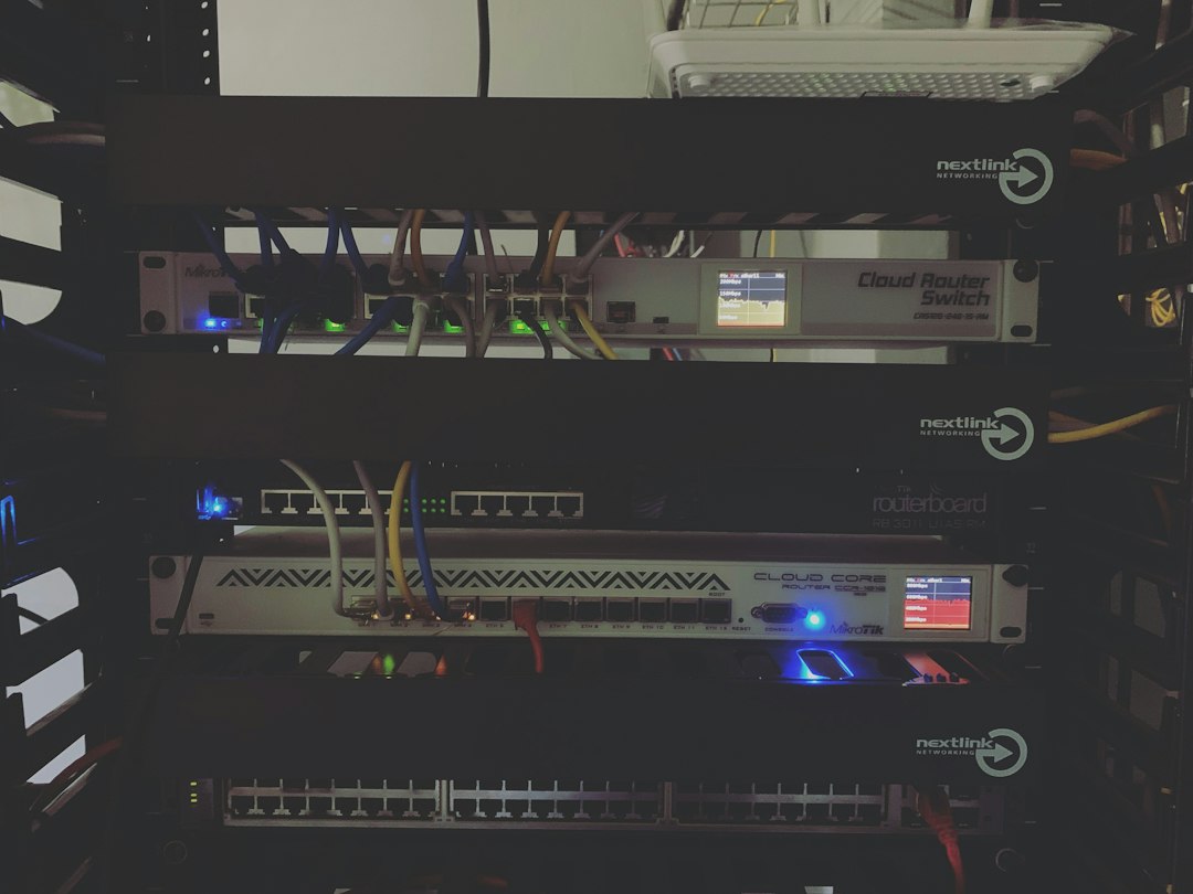 A clean, modern server rack in a data center with glowing blue lights, illustrating the importance of a solid technical foundation for AI search.